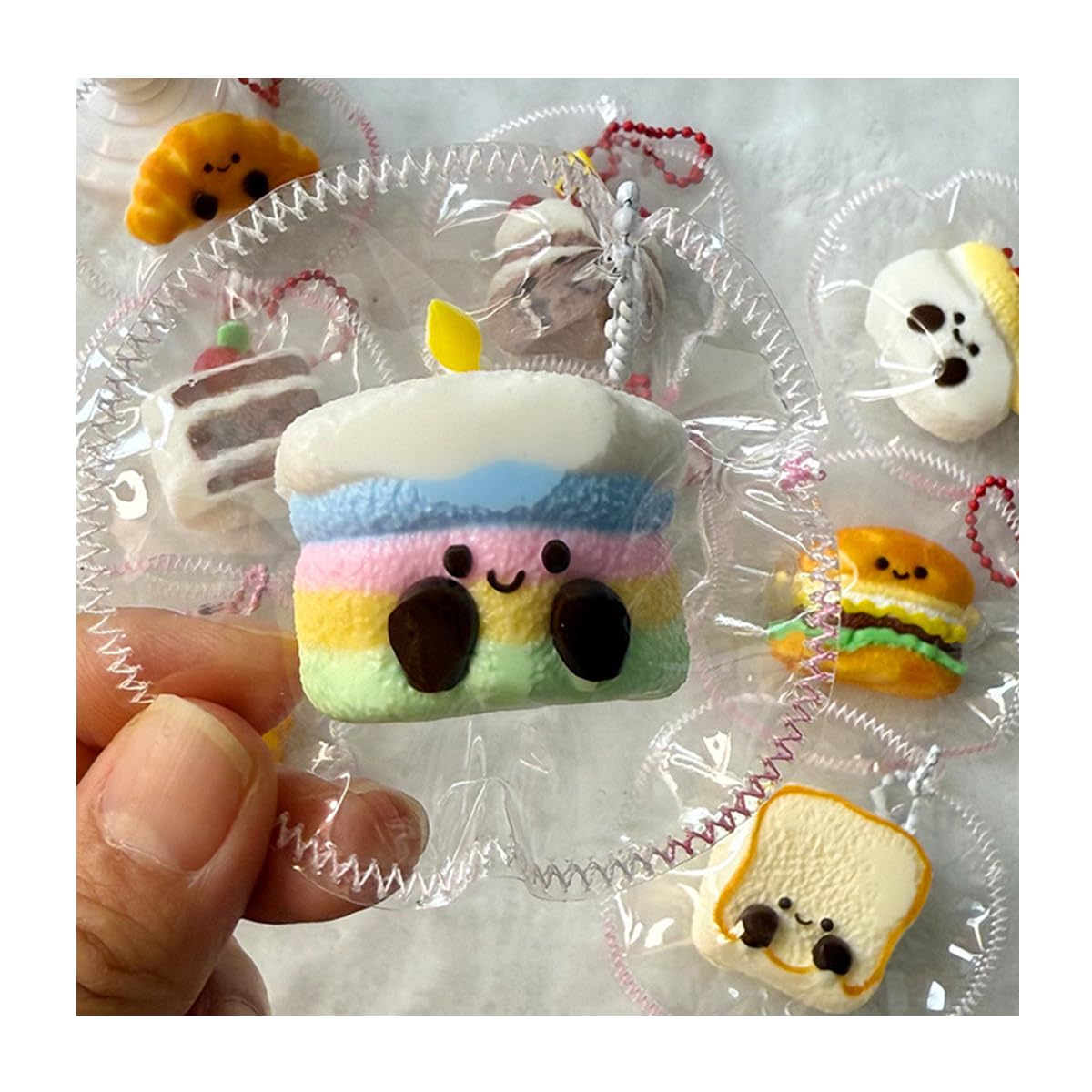Squishy Cake Toy Food Sample Keychain Bread Mini Relief Toy Cute Stretchy Soft Slow Return Stress Relief Suitable for Children and Adults Comes with Storage Bag (Cake)